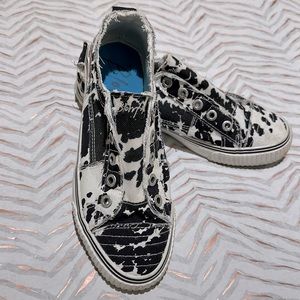Blowfish comfy cowprint slip ons.